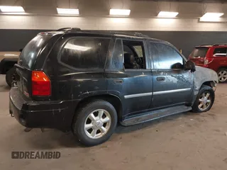 2007 GMC Envoy SLE with VIN 1GKDT13S872298442, listed as a IAAI auction lot 41343565 with 106,818 mi miles. Bid and sale history available at carsss.com. Image 4.
