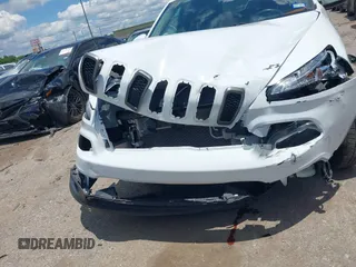 2018 Jeep Cherokee Latitude with VIN 1C4PJLCX3JD551801, listed as a IAAI auction lot 42226643 with 89,246 mi miles and . Bid and sale history available at DreamBid. Image 12.