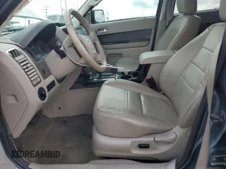 2010 Ford Escape Hybrid with VIN 1FMCU4K30AKC51022, listed as a Copart auction lot 51014615 with 128,275 mi miles and Salvage title. Bid and sale history available at DreamBid. Image 7.