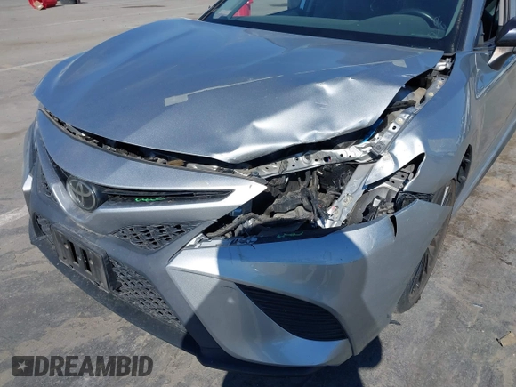 2019 Toyota Camry LE z VIN 4T1B11HKXKU259233, wystawiony jako IAAI lot #41870621 z przebiegiem 31 425 mil mil oraz . Historia ofert i sprzedaży dostępna na DreamBid. Obrazek 6.