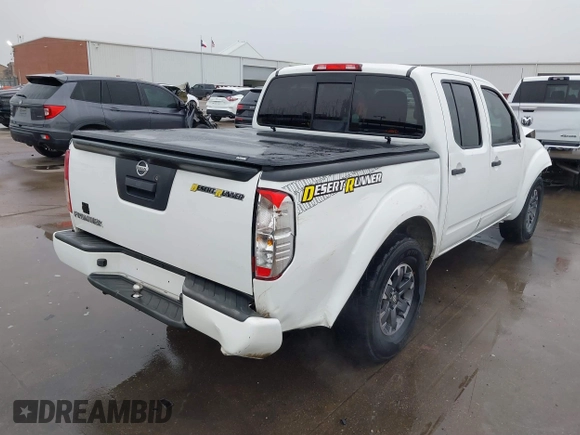 2014 Nissan Frontier SV with VIN 1N6AD0ER6EN751448, listed as a IAAI auction lot 41514633 with 238,204 mi miles and . Bid and sale history available at DreamBid. Image 4.