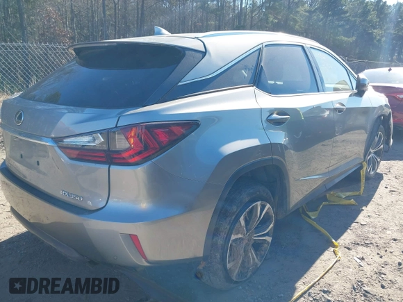 2017 Lexus RX with VIN 2T2ZZMCA8HC072487, listed as a IAAI auction lot 41161196 with 119,897 mi miles. Bid and sale history available at carsss.com. Image 4.