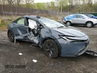 2024 Toyota Prius LE z VIN JTDACAAU6R3026309, wystawiony jako Copart lot #52873725 z przebiegiem 19 520 mil mil oraz Nie do naprawy • Non repairable. Historia ofert i sprzedaży dostępna na DreamBid. Obrazek 4.