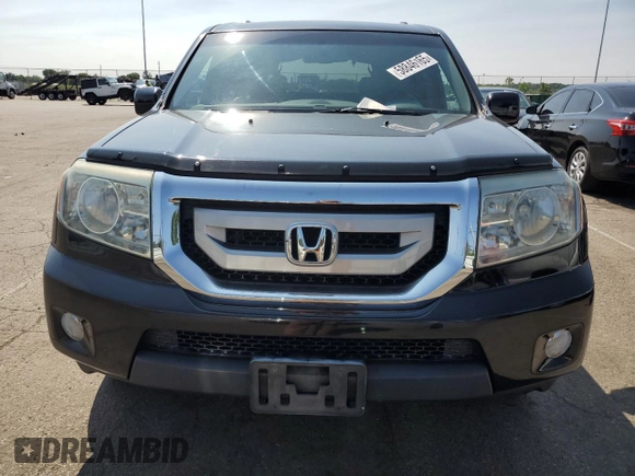 2011 Honda Pilot EX-L z VIN 5FNYF4H62BB036018, wystawiony jako Copart lot #58846165 z przebiegiem 199 116 mil mil oraz Szkoda całkowita • Salvage title. Historia ofert i sprzedaży dostępna na DreamBid. Obrazek 5.