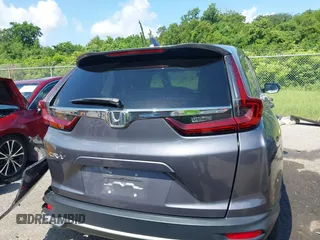 2021 Honda CR-V EX z VIN 2HKRW1H52MH425076, wystawiony jako IAAI lot #42442405 z przebiegiem 11 464 mil mil oraz . Historia ofert i sprzedaży dostępna na DreamBid. Obrazek 16.