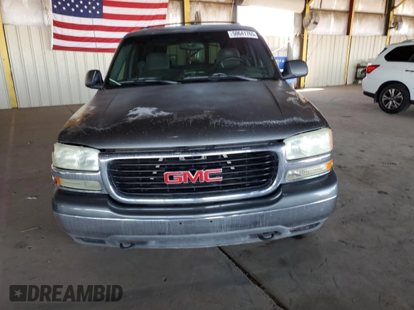 2002 GMC Yukon XL SLT z VIN 3GKFK16Z52G322815, wystawiony jako Copart lot #50641765 z przebiegiem Nie podano mil oraz Szkody całkowita. Historia ofert i sprzedaży dostępna na DreamBid. Obrazek 5.