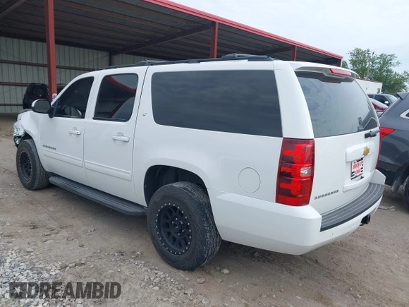 2013 Chevrolet Suburban LT with VIN 1GNSCJE05DR147101, listed as a IAAI auction lot 42336950 with 147,429 mi miles and . Bid and sale history available at DreamBid. Image 3.