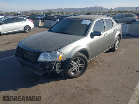 2012 Dodge Avenger SXT z VIN 1C3CDZCB6CN223500, wystawiony jako IAAI lot #41262587 z przebiegiem 166 085 mil mil oraz . Historia ofert i sprzedaży dostępna na DreamBid. Obrazek 2.