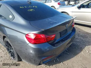 2015 BMW M4 with VIN WBS3R9C57FK334921, listed as a IAAI auction lot 41869773 with 107,058 mi miles. Bid and sale history available at carsss.com. Image 21.