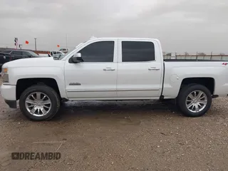 2018 Chevrolet Silverado 1500 High Country with VIN 3GCUKTEC1JG331991, listed as a IAAI auction lot 41718084 with 120,924 mi miles and . Bid and sale history available at DreamBid. Image 14.