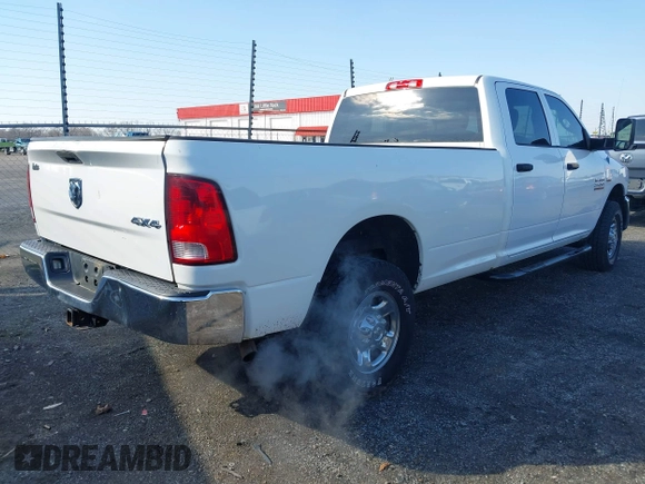 2013 Ram 2500 Tradesman z VIN 3C6TR5HT9DG575642, wystawiony jako IAAI lot #41557823 z przebiegiem 223 859 mil mil oraz . Historia ofert i sprzedaży dostępna na DreamBid. Obrazek 4.