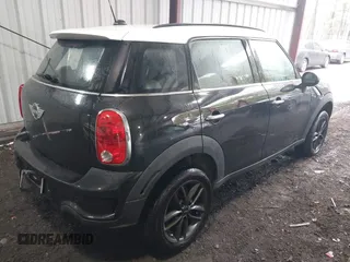 2014 MINI Countryman S with VIN WMWZC5C53EWP40677, listed as a IAAI auction lot 41473281 with 108,616 mi miles and . Bid and sale history available at DreamBid. Image 4.