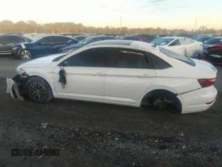 2021 Volkswagen Jetta S z VIN 3VWC57BU1MM017025, wystawiony jako IAAI lot #31656882 z przebiegiem 20 664 mil mil oraz . Historia ofert i sprzedaży dostępna na DreamBid. Obrazek 14.