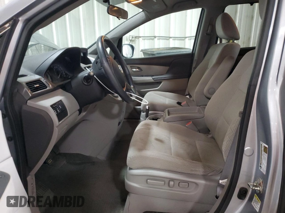 2016 Honda Odyssey SE with VIN 5FNRL5H31GB109718, listed as a Copart auction lot 54689915 with 48,933 mi miles and Salvage Title. Bid and sale history available at DreamBid. Image 7.