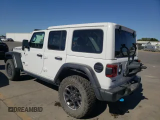2023 Jeep Wrangler Rubicon 20th Anniversary with VIN 1C4JJXR63PW538877, listed as a Copart auction lot 57635015 with 25,924 mi miles and Salvage title. Bid and sale history available at DreamBid. Image 2.