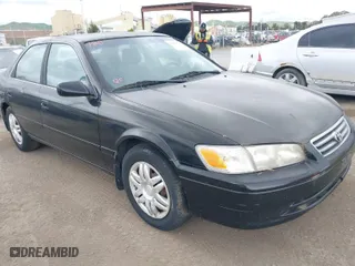 2000 Toyota Camry CE with VIN JT2BG22KXY0499280, listed as a IAAI auction lot 42075329 with 321,420 mi miles. Bid and sale history available at carsss.com. Image 1.
