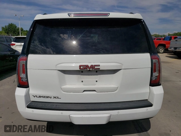 2019 GMC Yukon XL SLT with VIN 1GKS2GKC5KR362816, listed as a Copart auction lot 69062794 with 96,321 mi miles and Salvage Title. Bid and sale history available at DreamBid. Image 6.