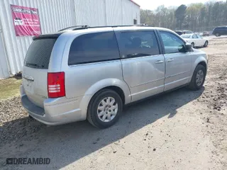 2010 Chrysler Town & Country LX with VIN 2A4RR4DE2AR113041, listed as a IAAI auction lot 41912924 with 200,143 mi miles. Bid and sale history available at carsss.com. Image 4.