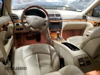 2005 Mercedes-Benz E-Class 3.2L CDI with VIN WDBUF26J95A810156, listed as a Copart auction lot 48124995 with 160,005 mi miles and Salvage Title. Bid and sale history available at carsss.com. Image 8.