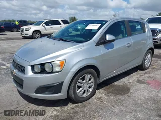 2014 Chevrolet Sonic LT with VIN 1G1JC6SH8E4216494, listed as a IAAI auction lot 41945905 with 160,002 mi miles. Bid and sale history available at carsss.com. Image 2.