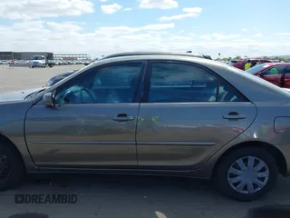 2004 Toyota Camry LE with VIN 4T1BE32K44U825561, listed as a IAAI auction lot 42051914 with 244,521 mi miles and . Bid and sale history available at DreamBid. Image 13.