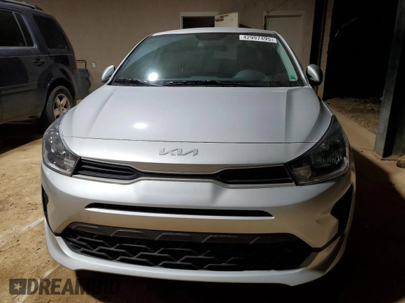 2023 Kia Rio S with VIN 3KPA24AD0PE603054, listed as a Copart auction lot 42997495 with 26,573 mi miles and Salvage Title. Bid and sale history available at carsss.com. Image 5.