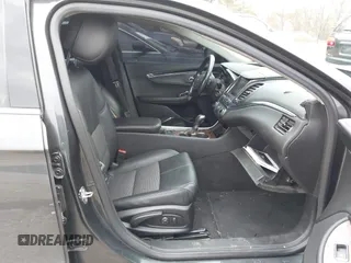 2014 Chevrolet Impala LT with VIN 1G1115SL1EU110327, listed as a IAAI auction lot 42136078 with 154,830 mi miles and . Bid and sale history available at DreamBid. Image 5.