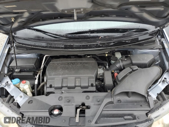 2014 Honda Odyssey EX-L with VIN 5FNRL5H68EB103941, listed as a Copart auction lot 60715095 with 109,013 mi miles and Salvage title. Bid and sale history available at DreamBid. Image 12.