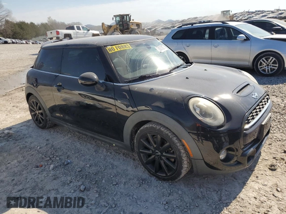 2016 MINI Hardtop S with VIN WMWXP7C55G3B49216, listed as a Copart auction lot 50579275 with 107,977 mi miles and Salvage Title. Bid and sale history available at DreamBid. Image 4.