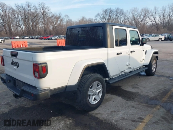 2023 Jeep Gladiator Sport S z VIN 1C6HJTAG7PL535209, wystawiony jako IAAI lot #41483780 z przebiegiem 39 376 mil mil oraz . Historia ofert i sprzedaży dostępna na DreamBid. Obrazek 4.