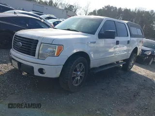 2014 Ford F-150 XL with VIN 1FTFW1EF2EFB93610, listed as a IAAI auction lot 41515501 with 211,415 mi miles and . Bid and sale history available at DreamBid. Image 17.