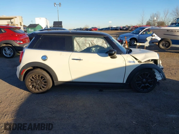 2020 MINI Hardtop Cooper S z VIN WMWXR5C00L2L49498, wystawiony jako IAAI lot #40679562 z przebiegiem 48 387 mil mil oraz . Historia ofert i sprzedaży dostępna na DreamBid. Obrazek 13.
