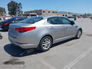 2013 Kia Optima LX with VIN KNAGM4A72D5399117, listed as a IAAI auction lot 42174312 with 105,661 mi miles and . Bid and sale history available at carsss.com. Image 4.