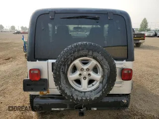 2003 Jeep Wrangler Sport z VIN 1J4FA49S93P306817, wystawiony jako Copart lot #60136385 z przebiegiem 217 208 mil mil oraz Czysty tytuł • Clean title. Historia ofert i sprzedaży dostępna na DreamBid. Obrazek 6.