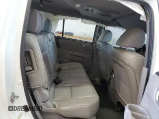 2014 Honda Pilot Touring z VIN 5FNYF4H99EB011079, wystawiony jako Copart lot #57869765 z przebiegiem Nie podano mil oraz Szkoda całkowita • Salvage title. Historia ofert i sprzedaży dostępna na DreamBid. Obrazek 11.