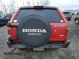 1996 Honda Passport z VIN 4S6CM58V3T4400052, wystawiony jako Copart lot #41616755 z przebiegiem 134 910 mil mil oraz Szkody całkowita. Historia ofert i sprzedaży dostępna na DreamBid. Obrazek 6.
