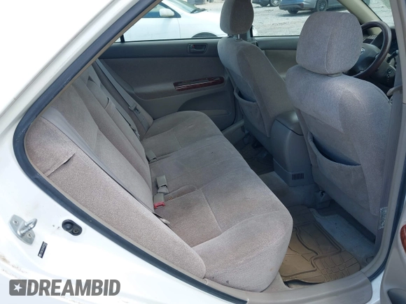 2004 Toyota Camry LE with VIN JTDBE32KX40279599, listed as a IAAI auction lot 42202160 with 288,879 mi miles and . Bid and sale history available at carsss.com. Image 8.