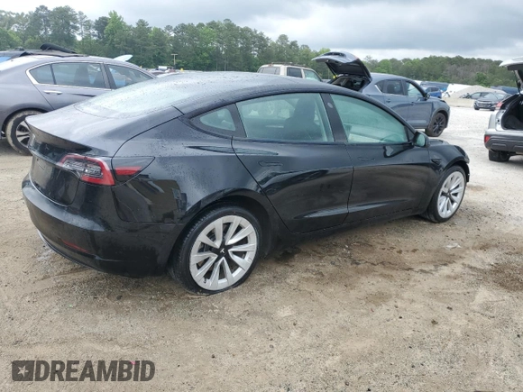 2022 Tesla Model 3 with VIN 5YJ3E1EA0NF372095, listed as a Copart auction lot 54958215 with 148,441 mi miles and Clean Title. Bid and sale history available at DreamBid. Image 3.