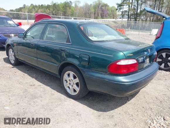 2001 Mazda 626 LX z VIN 1YVGF22D915241384, wystawiony jako IAAI lot #41927705 z przebiegiem 231 801 mil mil oraz . Historia ofert i sprzedaży dostępna na DreamBid. Obrazek 3.