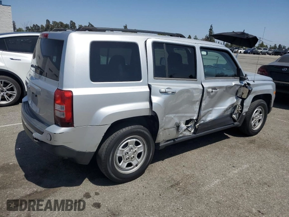 2014 Jeep Patriot Sport with VIN 1C4NJPBB1ED512442, listed as a Copart auction lot 61415565 with 211,715 mi miles and Salvage title. Bid and sale history available at DreamBid. Image 3.
