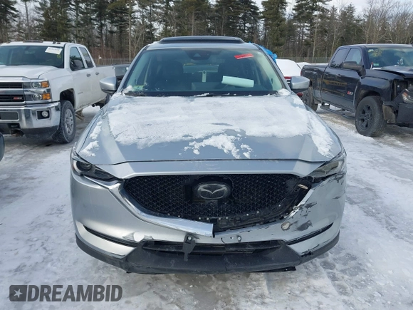 2021 Mazda CX-5 Grand Touring Reserve with VIN JM3KFBAY0M0377030, listed as a IAAI auction lot 41606709 with 39,590 mi miles. Bid and sale history available at carsss.com. Image 12.