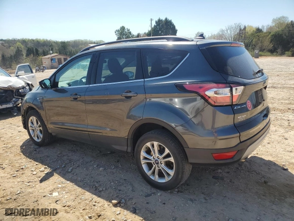 2018 Ford Escape SE with VIN 1FMCU0GD4JUD14296, listed as a Copart auction lot 50409185 with 80,700 mi miles and Salvage Title. Bid and sale history available at carsss.com. Image 2.