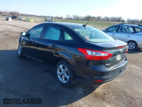 2013 Ford Focus SE with VIN 1FADP3F28DL260843, listed as a IAAI auction lot 41889090 with 131,636 mi miles. Bid and sale history available at carsss.com. Image 3.