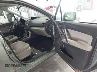 2015 Subaru Forester Touring with VIN JF2SJAUC5FH518262, listed as a IAAI auction lot 42789542 with 182,869 mi miles and . Bid and sale history available at DreamBid. Image 5.