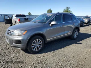 2013 Volkswagen Touareg Lux z VIN WVGEF9BP8DD009350, wystawiony jako Copart lot #55775385 z przebiegiem 165 958 mil mil oraz Czysty tytuł • Clean title. Historia ofert i sprzedaży dostępna na DreamBid. Obrazek 1.