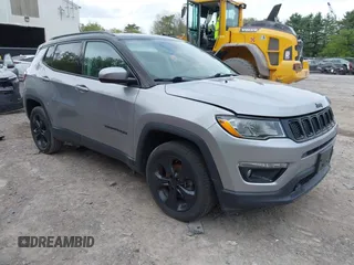 2019 Jeep Compass Latitude with VIN 3C4NJDBB5KT782858, listed as a IAAI auction lot 42263404 with 64,315 mi miles and . Bid and sale history available at DreamBid. Image 1.