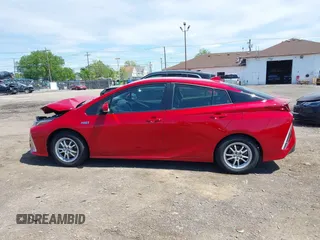 2021 Toyota Prius LE with VIN JTDKAMFP6M3192515, listed as a IAAI auction lot 42302003 with 74,247 mi miles and . Bid and sale history available at DreamBid. Image 14.