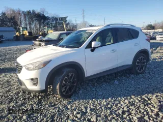 2016 Mazda CX-5 Grand Touring with VIN JM3KE2DY8G0734716, listed as a Copart auction lot 85675354 with 130,802 mi miles and Salvage Title. Bid and sale history available at carsss.com. Image 1.