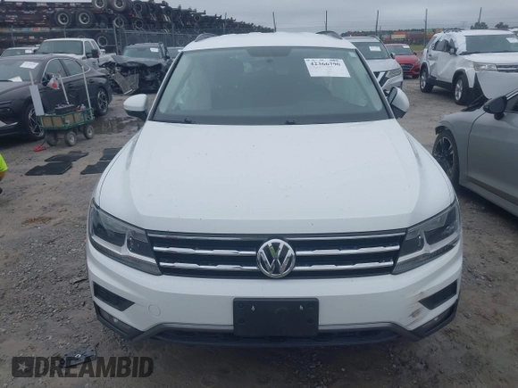 2018 Volkswagen Tiguan S with VIN 3VV1B7AX1JM032250, listed as a IAAI auction lot 42366790 with 65,406 mi miles and . Bid and sale history available at DreamBid. Image 12.
