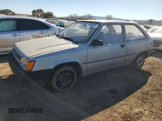 1986 Toyota Tercel z VIN JT2AL31G5G0429131, wystawiony jako Copart lot #79204554 z przebiegiem 124 477 mil mil oraz Szkoda całkowita • Salvage title. Historia ofert i sprzedaży dostępna na DreamBid. Obrazek 1.